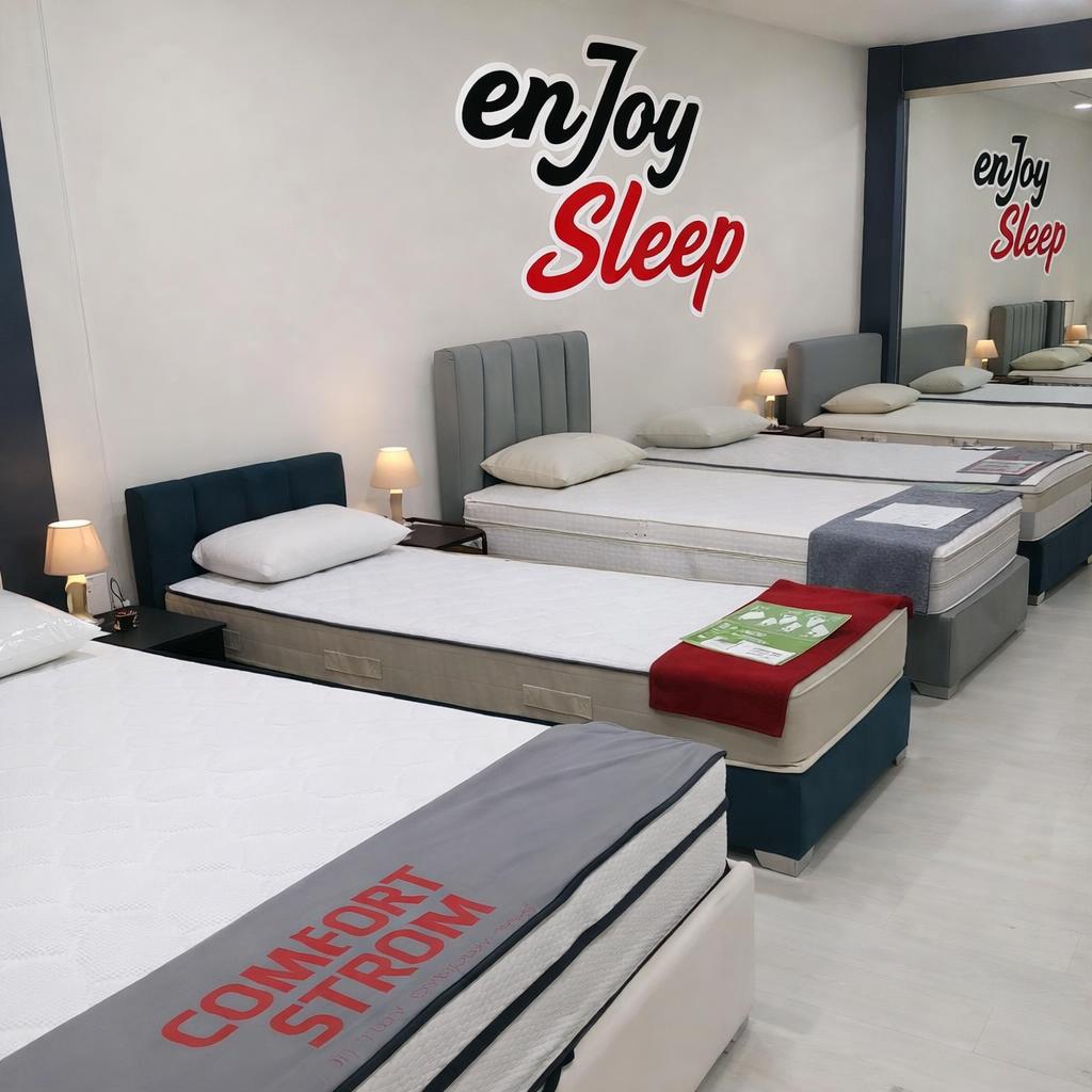 Enjoy Sleep showroom with mattresses